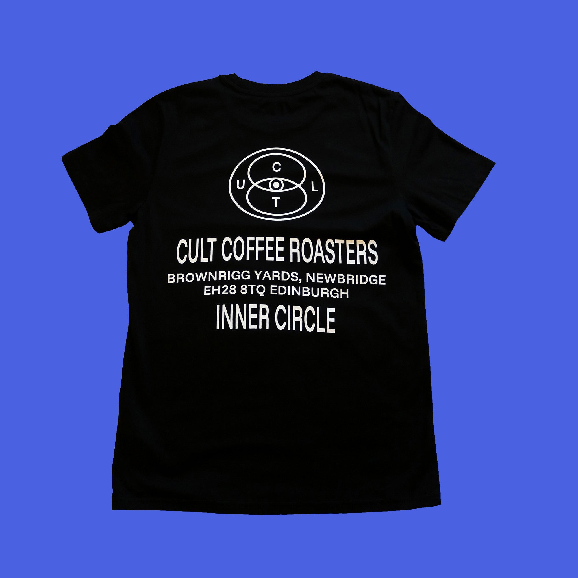 Black t-shirt on blue background with white writing reading: Cult Coffee Roasters, Brownrigg Yards, Newbridge, Edinburgh. Says 'Inner Circle' at the bottom. 